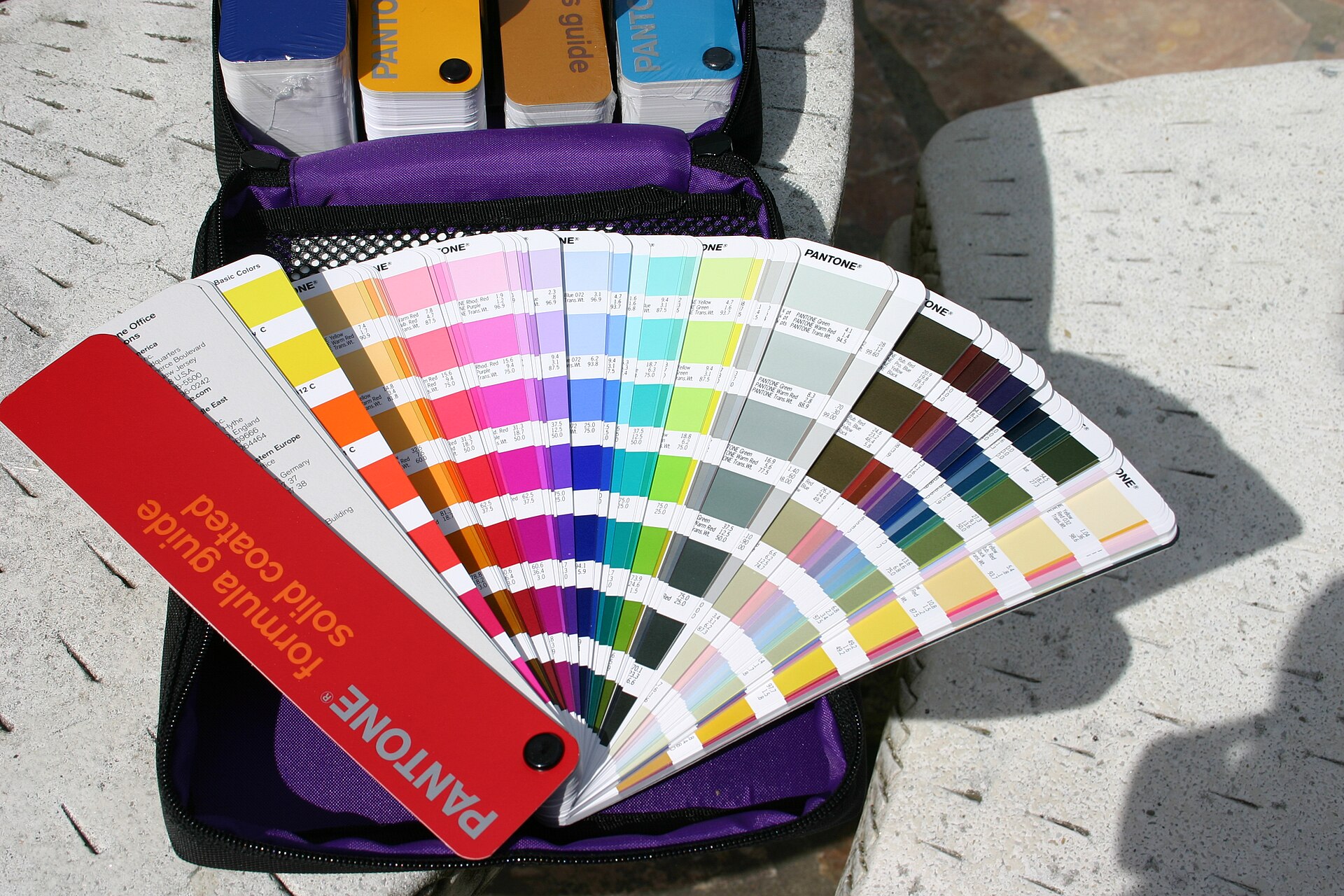 A fan of Pantone colour swatches used for print colour matching